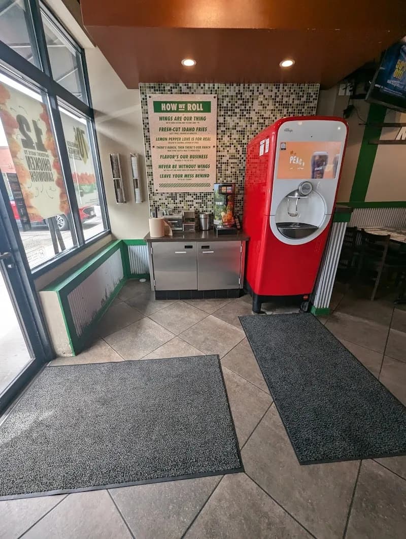 Wingstop storefront outside and inside view at 4952 E. 62nd Ave in Commerce City, Colorado