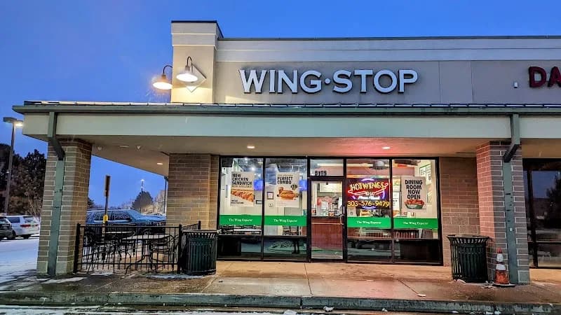 Wingstop storefront outside and inside view at 5125 Chambers Rd Unit C in Denver, Colorado