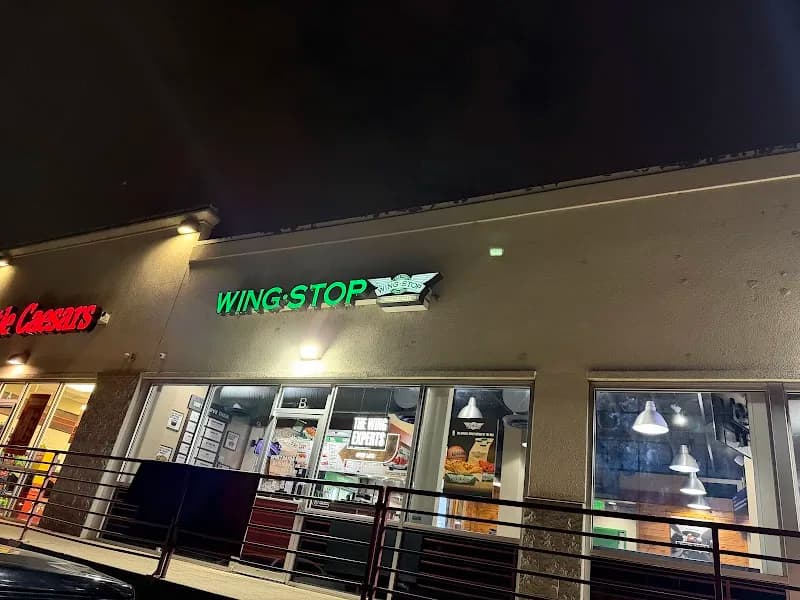 Wingstop storefront outside and inside view at 2001 W Alameda Ave in Denver, Colorado