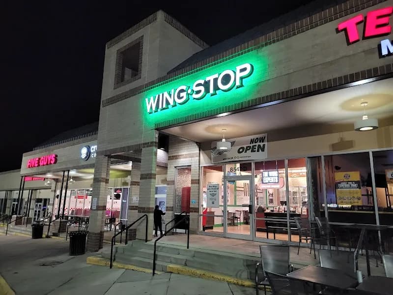 Wingstop storefront outside and inside view at 8547 E. Arapahoe Road in Greenwood Village, Colorado