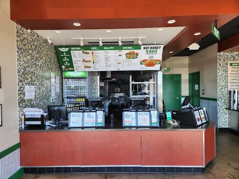 Wingstop storefront outside and inside view at 2729 W. Belleview Avenue in Littleton, Colorado