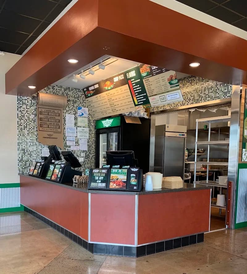 Wingstop storefront outside and inside view at 3033 N. Garfield Ave in Loveland, Colorado
