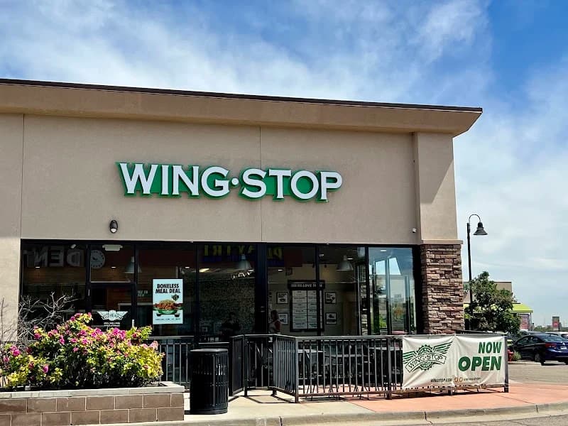 Wingstop storefront outside and inside view at 13644 Orchard Parkway in Westminster, Colorado