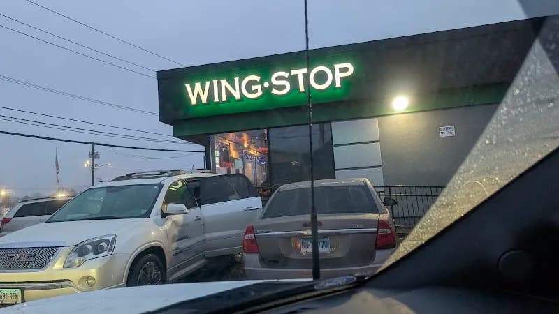 Wingstop storefront outside and inside view at 51 Boston Ave in Bridgeport, Connecticut