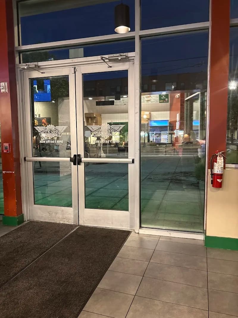 Wingstop storefront outside and inside view at 300 Riggs Rd NE in Washington, Washington DC