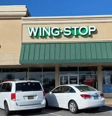 Wingstop storefront outside and inside view at 4723C Kirkwood Hwy in Wilmington, Delaware