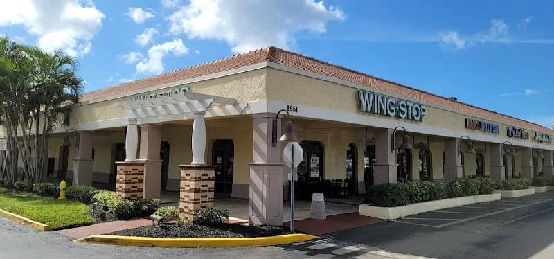 Wingstop storefront outside and inside view at 8951 Bonita Beach Rd Ste 265 in Bonita Springs, Florida