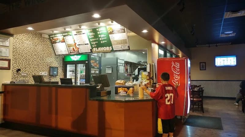 Wingstop storefront outside and inside view at 3553 1st St E in Bradenton, Florida