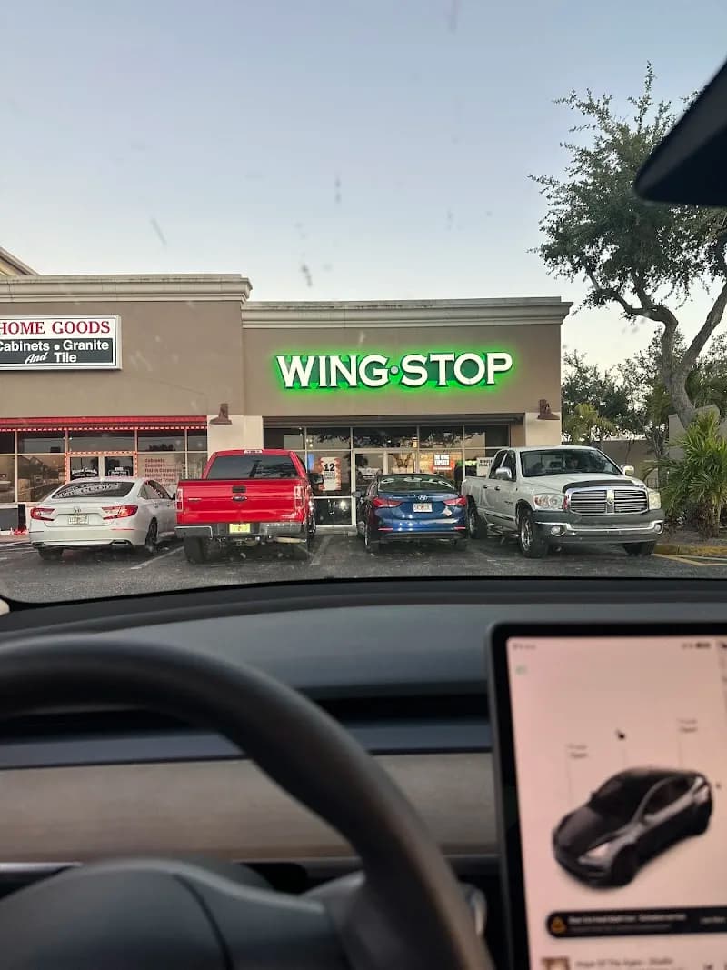 Wingstop storefront outside and inside view at 1480 NE Pine Island Road in Cape Coral, Florida