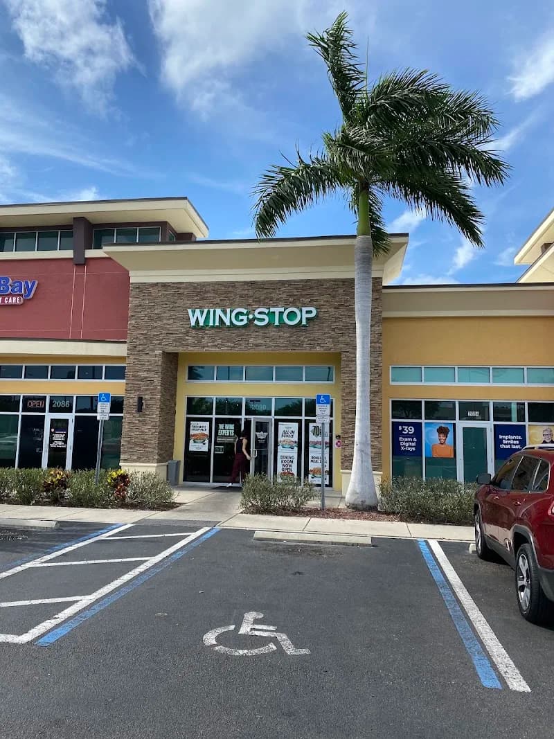 Wingstop storefront outside and inside view at 2090 Gulf to Bay Blvd. in Clearwater, Florida
