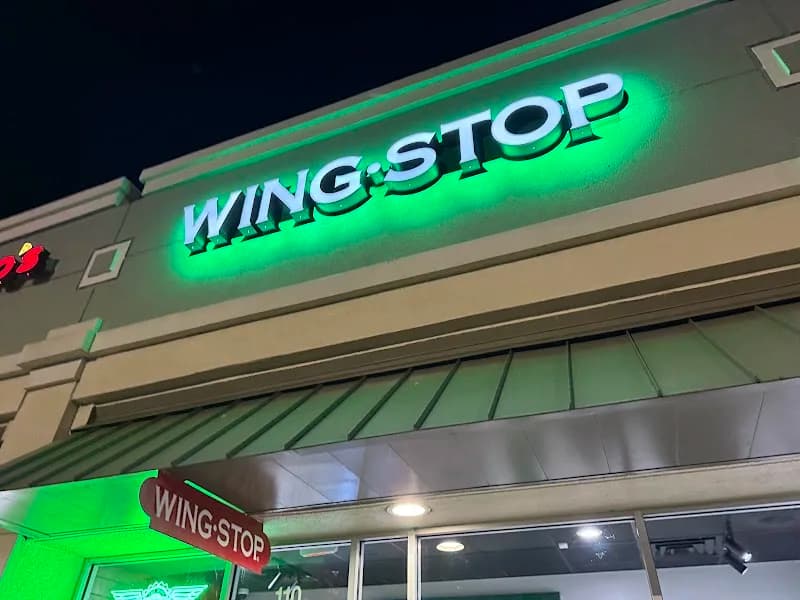 Wingstop storefront outside and inside view at 2301 FL-524 in Cocoa, Florida