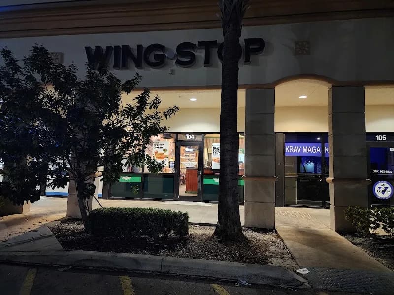 Wingstop storefront outside and inside view at 4570 Lyons Rd Ste 104 in Coconut Creek, Florida