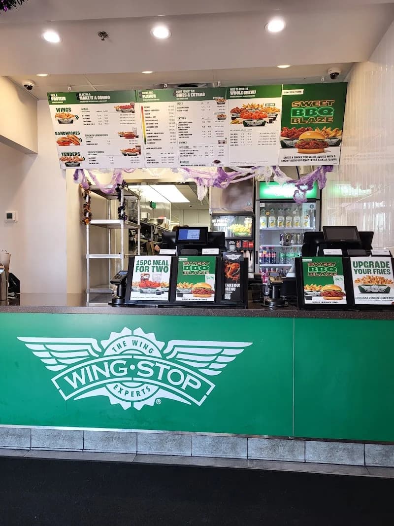 Wingstop storefront outside and inside view at 305 E. International Speedway Blvd in Deland, Florida