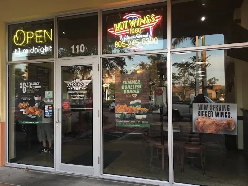 Wingstop storefront outside and inside view at 33550 S Dixie Hwy Ste 110 in Florida City, Florida