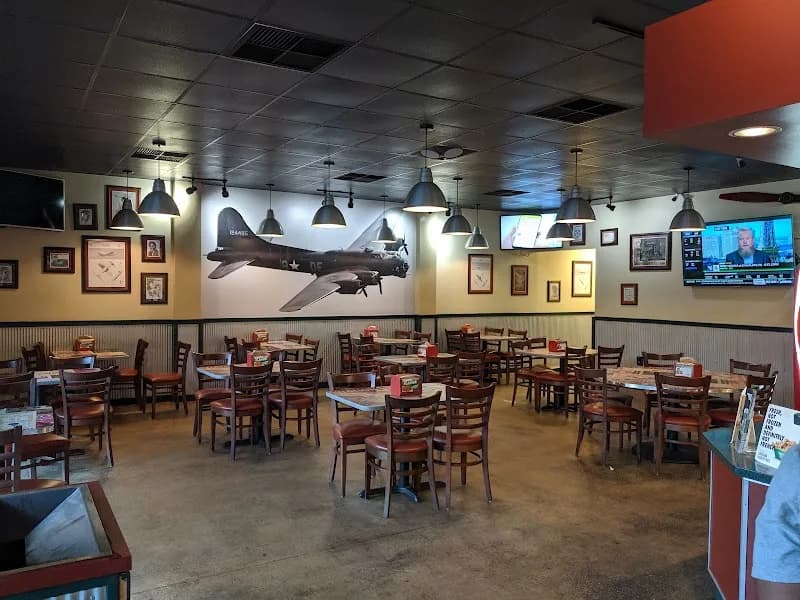 Wingstop storefront outside and inside view at 25 NW 16TH Ave in Gainesville, Florida