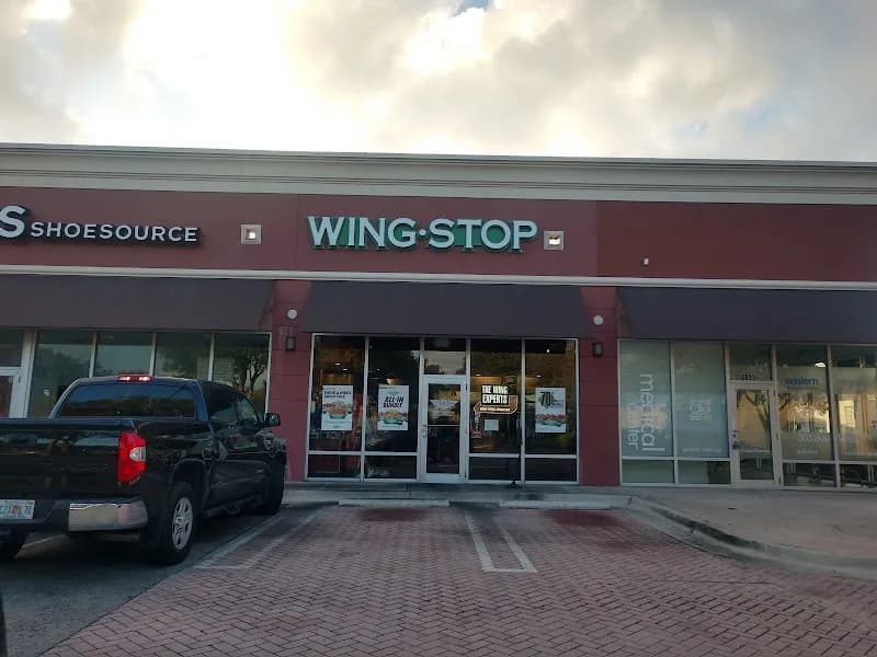 Wingstop storefront outside and inside view at 3685 W. 18th Ave in Hialeah, Florida