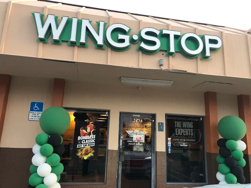 Wingstop storefront outside and inside view at 2438 Sheridan St in Hollywood, Florida