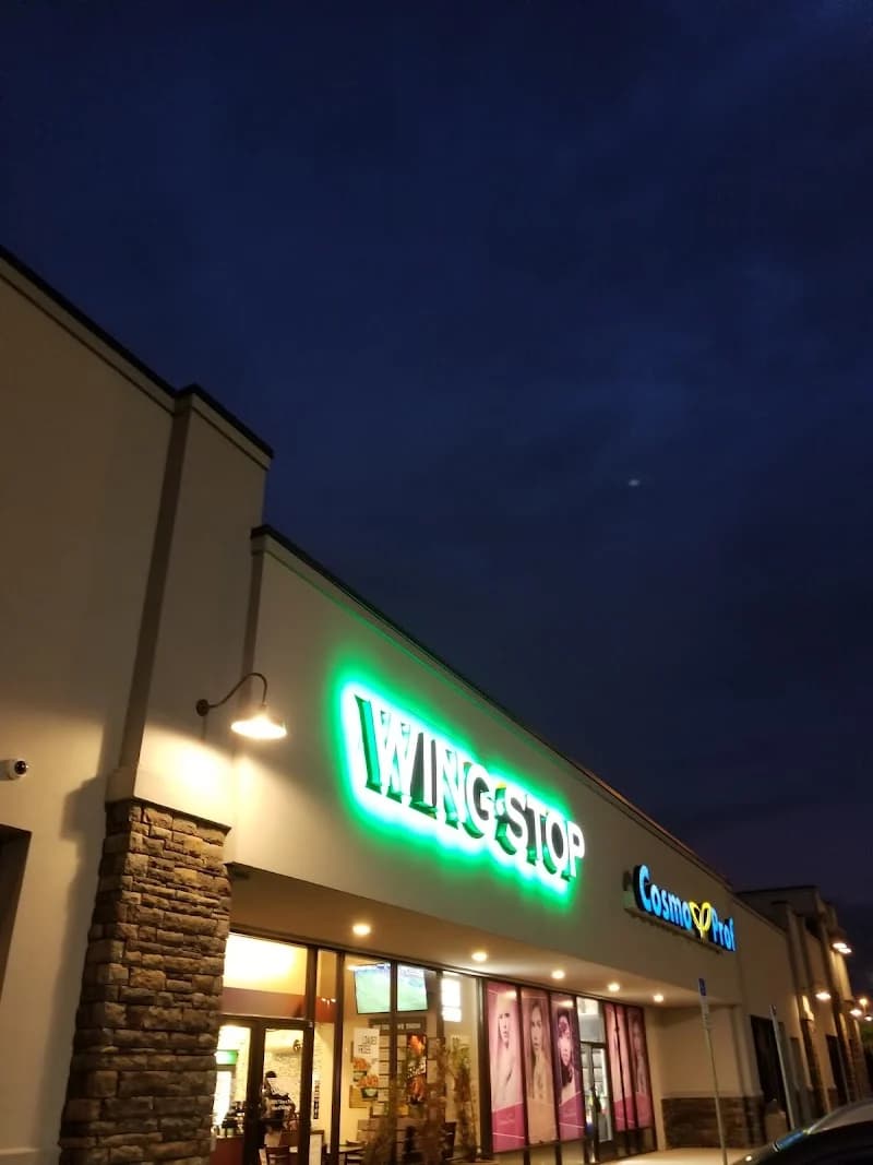 Wingstop storefront outside and inside view at 9416 Arlington Expy in Jacksonvile, Florida