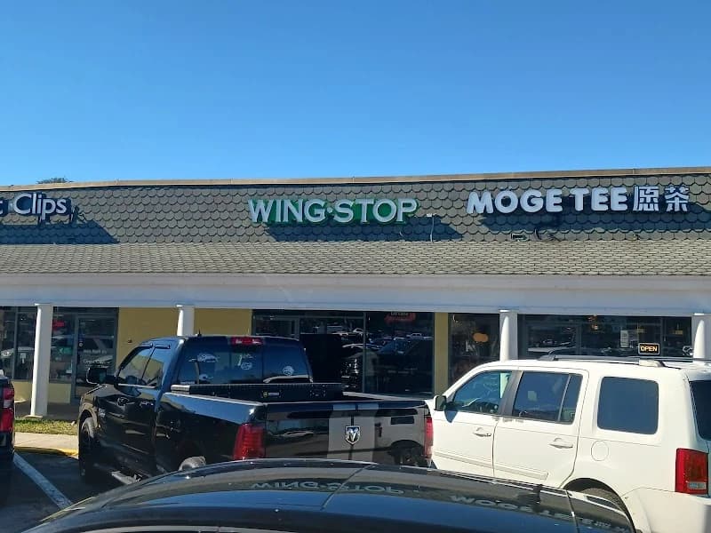 Wingstop storefront outside and inside view at 9934 Old Baymeadows Rd in Jacksonville, Florida