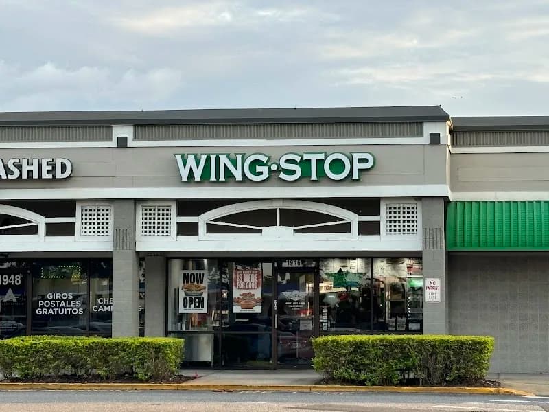 Wingstop storefront outside and inside view at 1944 Osceola Pkwy in Kissimmee, Florida