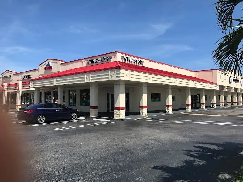 Wingstop storefront outside and inside view at 968 Northlake Blvd in Lake Park, Florida