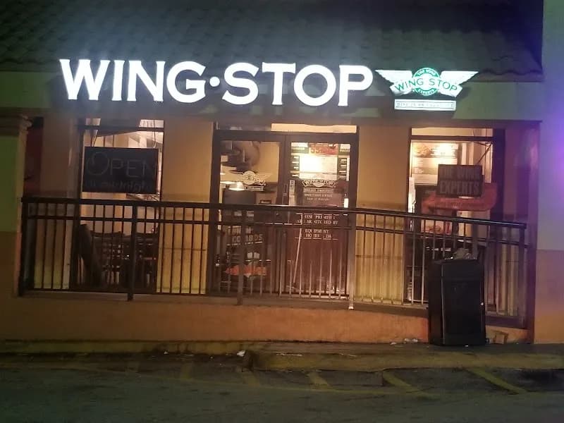 Wingstop storefront outside and inside view at 5963 W Oakland Park Blvd in Lauderhill, Florida