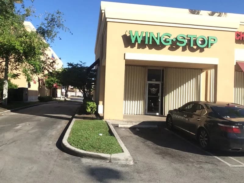 Wingstop storefront outside and inside view at 651 NW 62Nd St in Miami, Florida