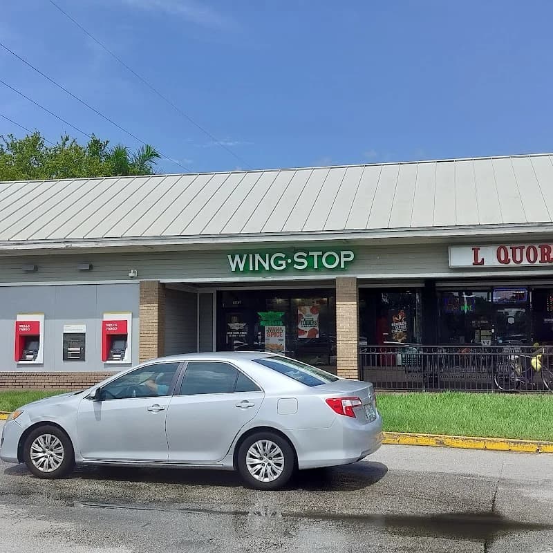 Wingstop storefront outside and inside view at 13787 SW 152nd Street in Miami, Florida