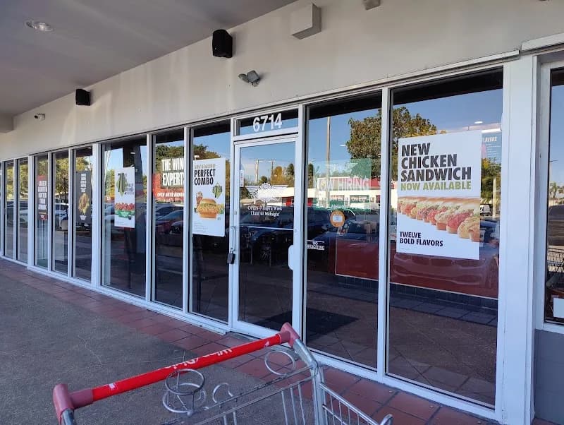 Wingstop storefront outside and inside view at 6714 Bird Road in Miami, Florida