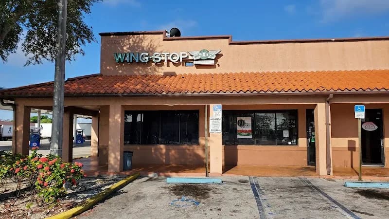 Wingstop storefront outside and inside view at 16650 NW 27Th Ave in Miami Gardens, Florida