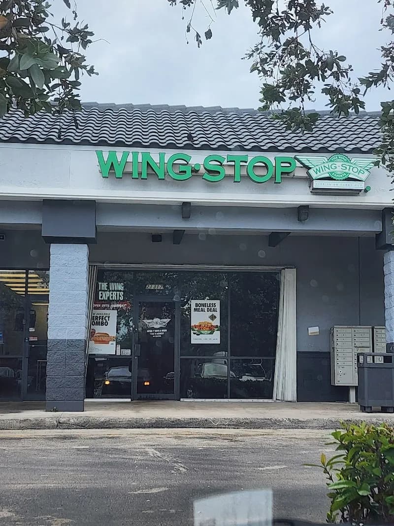 Wingstop storefront outside and inside view at 21317 Nw 2nd Ave in Miami Gardens, Florida