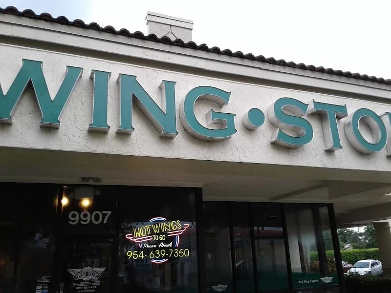 Wingstop storefront outside and inside view at 9907 Miramar Pkwy in Miramar, Florida