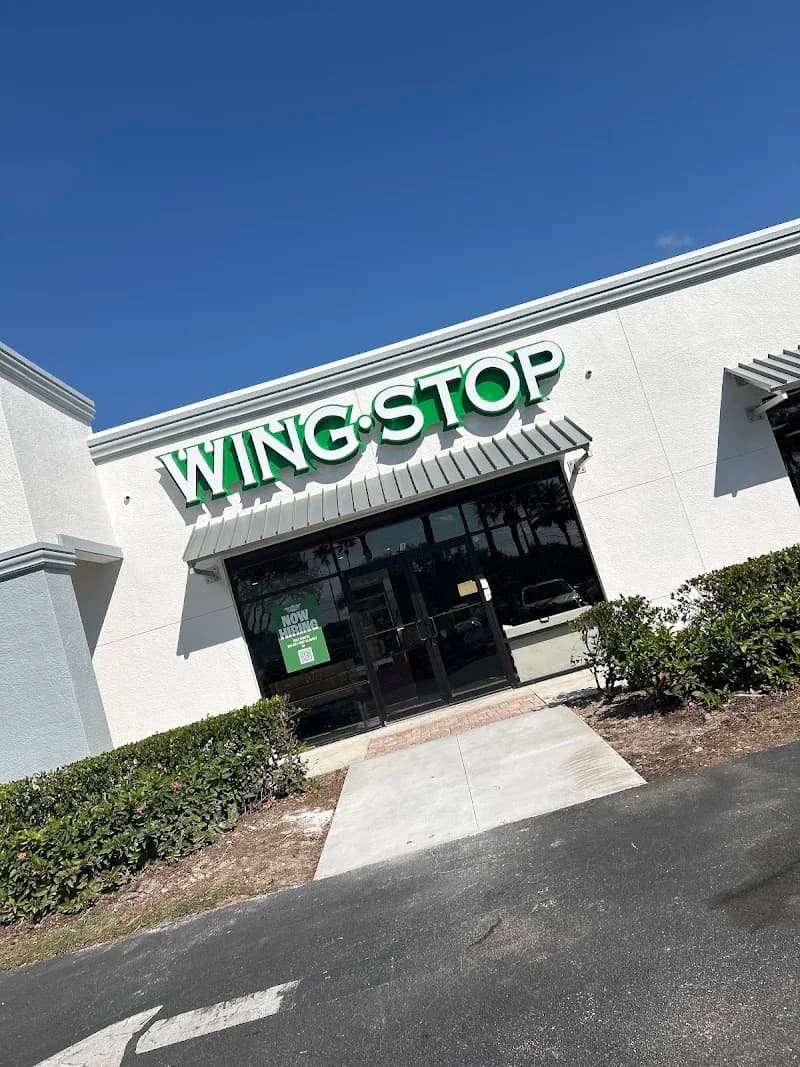 Wingstop storefront outside and inside view at 7740 Preserve Ln in Naples, Florida