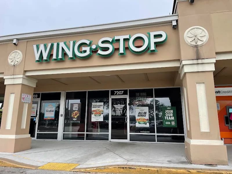 Wingstop storefront outside and inside view at 7207 Radio Road in Naples, Florida