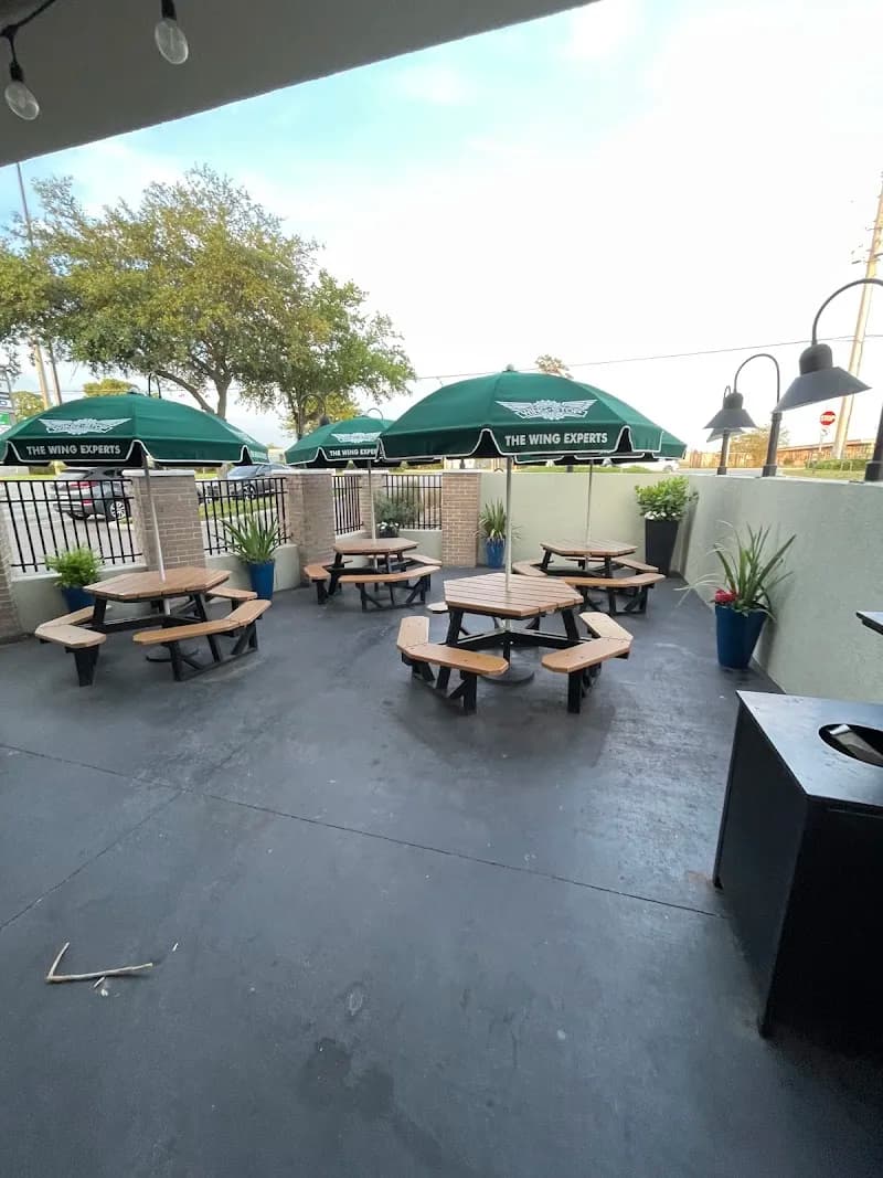 Wingstop storefront outside and inside view at 410 Blanding Blvd Ste 15 in Orange Park, Florida