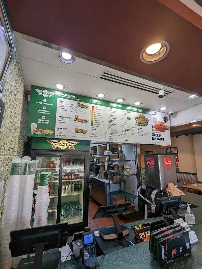 Wingstop storefront outside and inside view at 2520 S Semoran Ave in Orlando, Florida