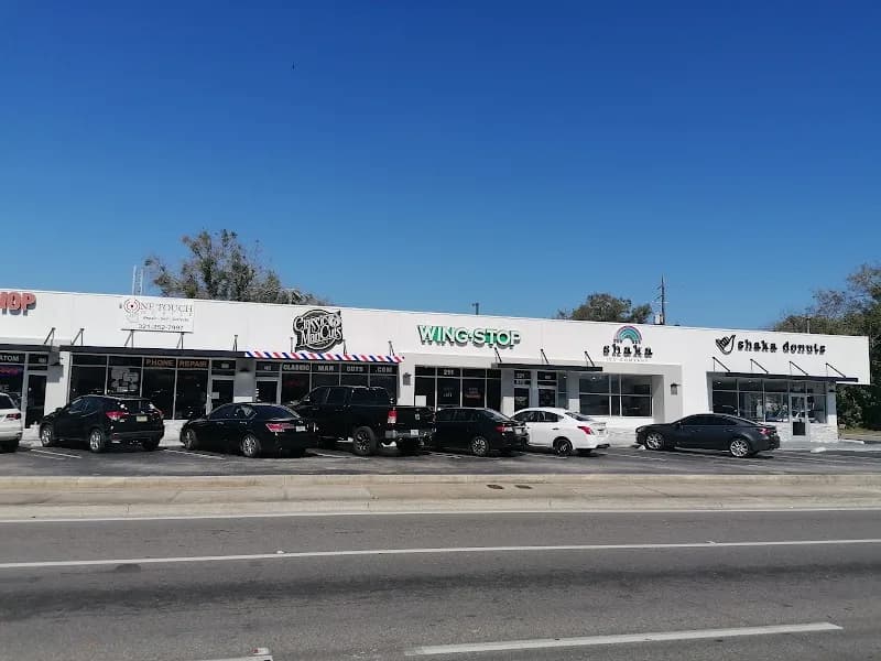 Wingstop storefront outside and inside view at 211 E. Michigan Street Suite 221 in Orlando, Florida