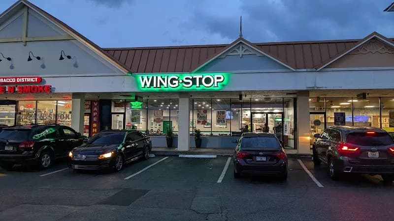 Wingstop storefront outside and inside view at 4700 Babcock St. NE in Palm Bay, Florida