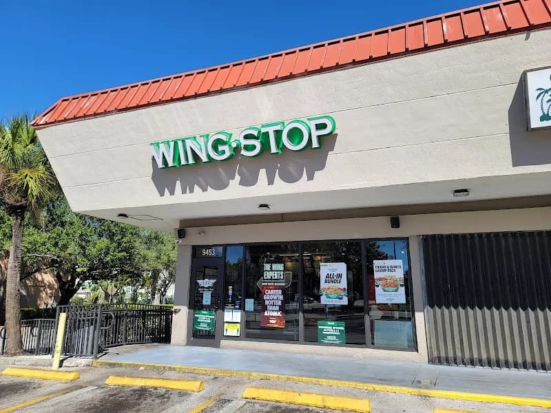 Wingstop storefront outside and inside view at 9493 SW 160th St. in Palmetto Bay, Florida