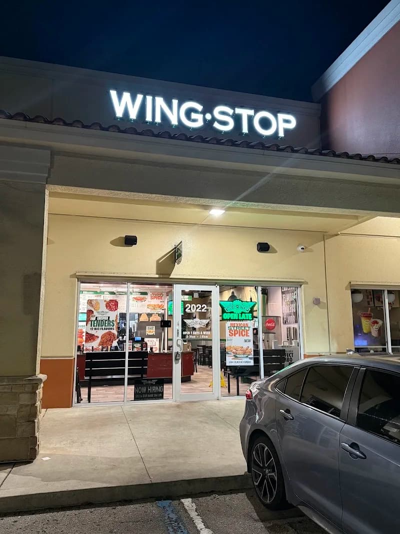 Wingstop storefront outside and inside view at 2022 N. Flamingo Rd in Pembroke Pines, Florida