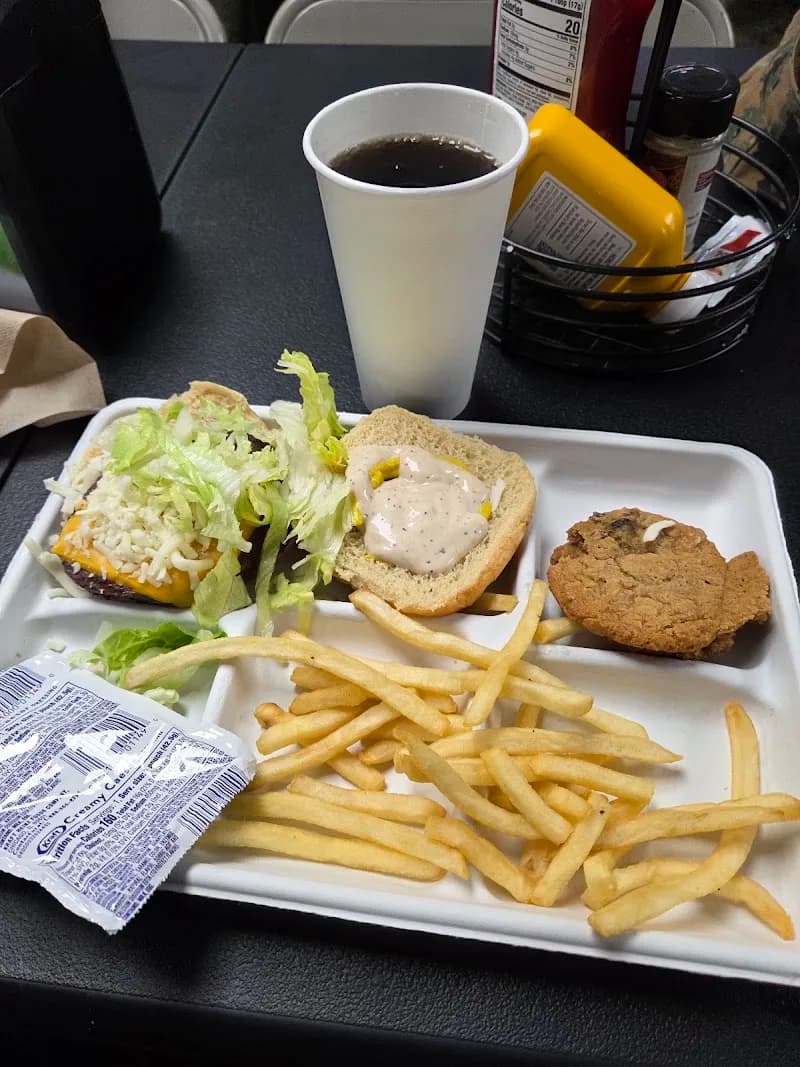 Wingstop storefront outside and inside view at 570 East Ave in Pensacola, Florida