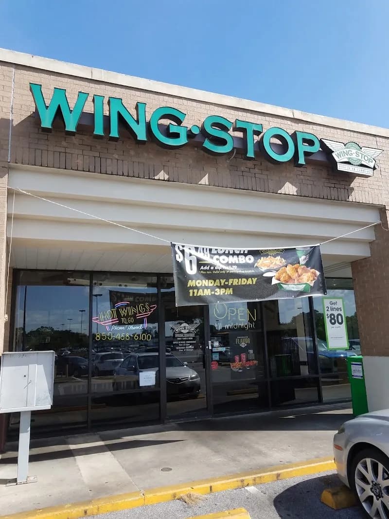 Wingstop storefront outside and inside view at 4600 Mobile Hwy Ste 6 in Pensacola, Florida