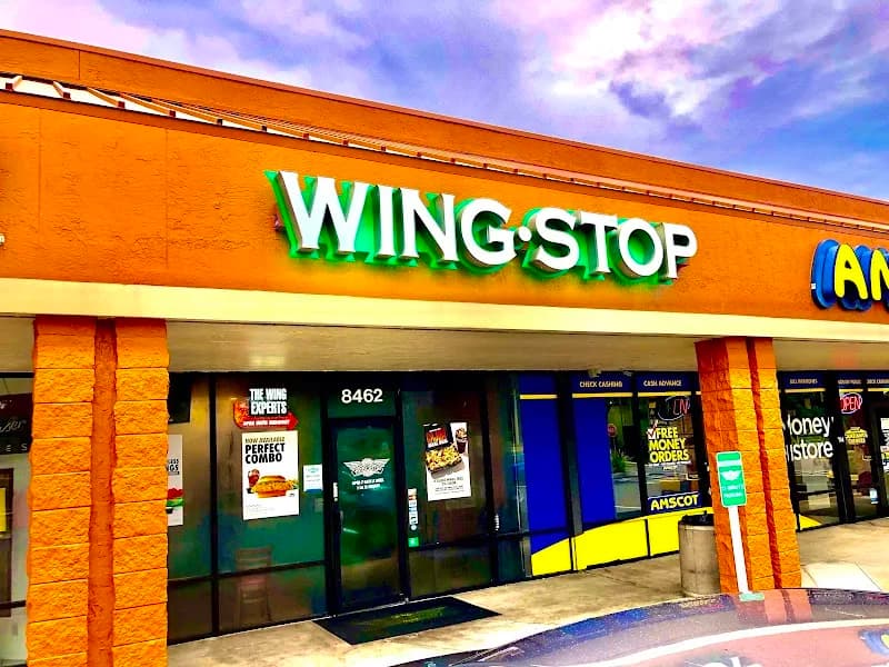 Wingstop storefront outside and inside view at 8462 Lockwood Ridge Rd in Sarasota, Florida