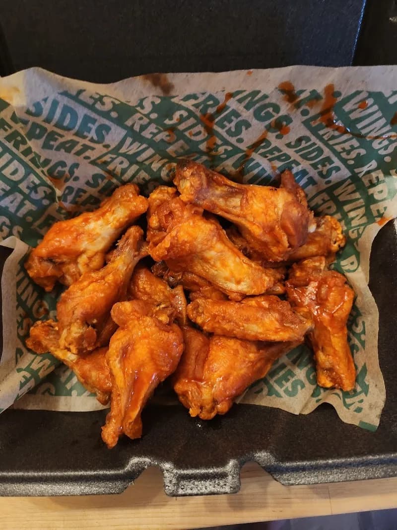 Wingstop storefront outside and inside view at 11206Spring Hill Drive in Spring Hill, Florida