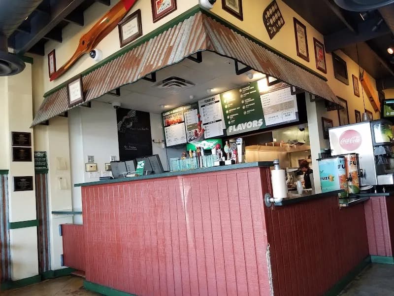 Wingstop storefront outside and inside view at 1964 W Tennessee St Ste 4 in Tallahassee, Florida