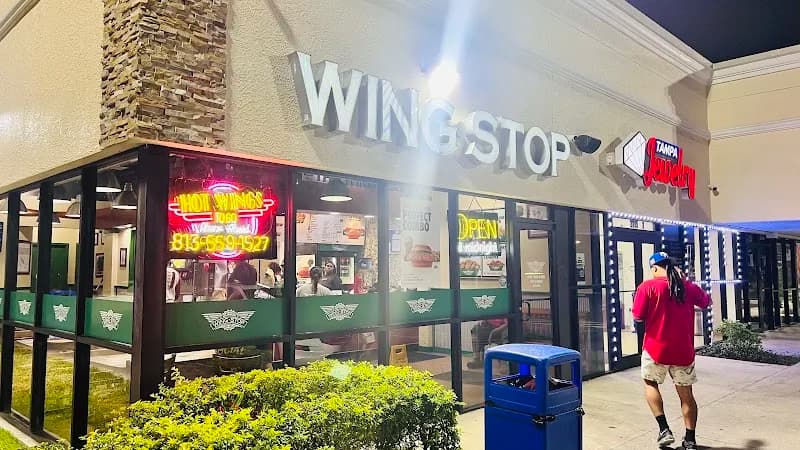 Wingstop storefront outside and inside view at 2115 E. Hillsborough in Tampa, Florida