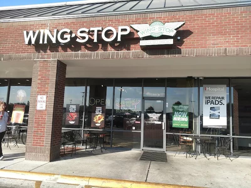 Wingstop storefront outside and inside view at 2776 E Fowler Ave in Tampa, Florida