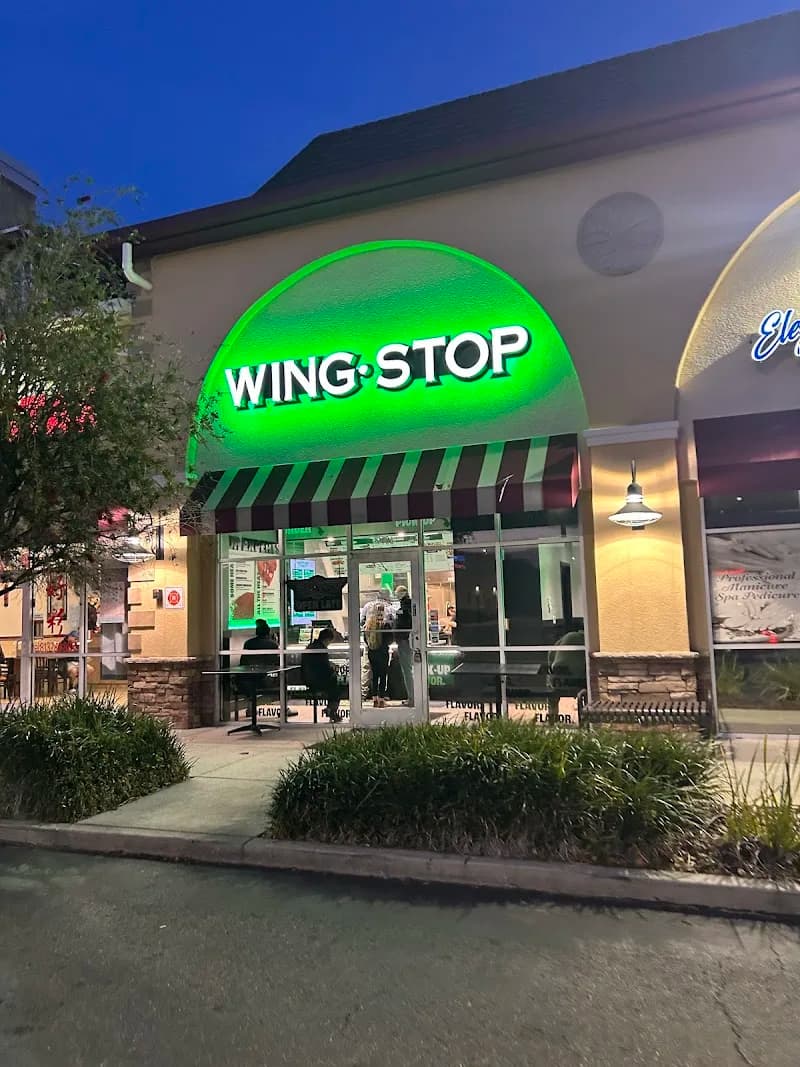 Wingstop storefront outside and inside view at 7936 Gall Blvd in Zephyrhills, Florida