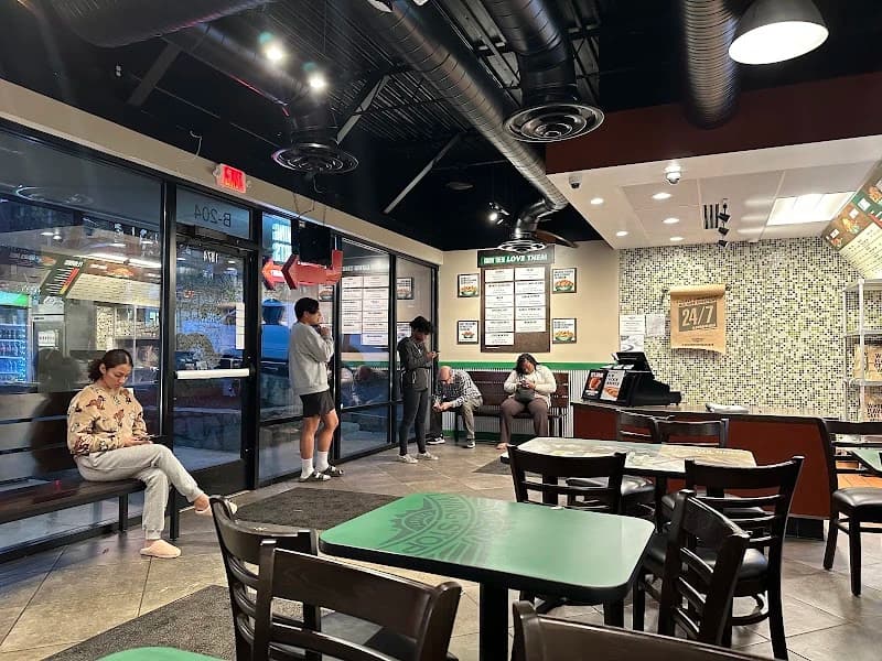 Wingstop storefront outside and inside view at 1874 Piedmont Ave. NE in Atlanta, Georgia