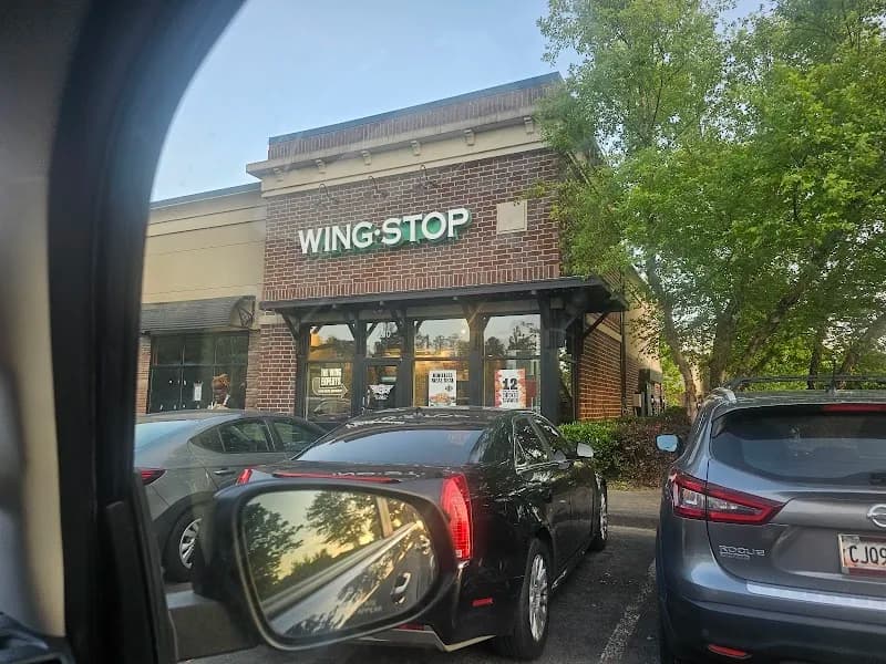 Wingstop storefront outside and inside view at 6175 Old National Hwy STE 460 in Atlanta, Georgia